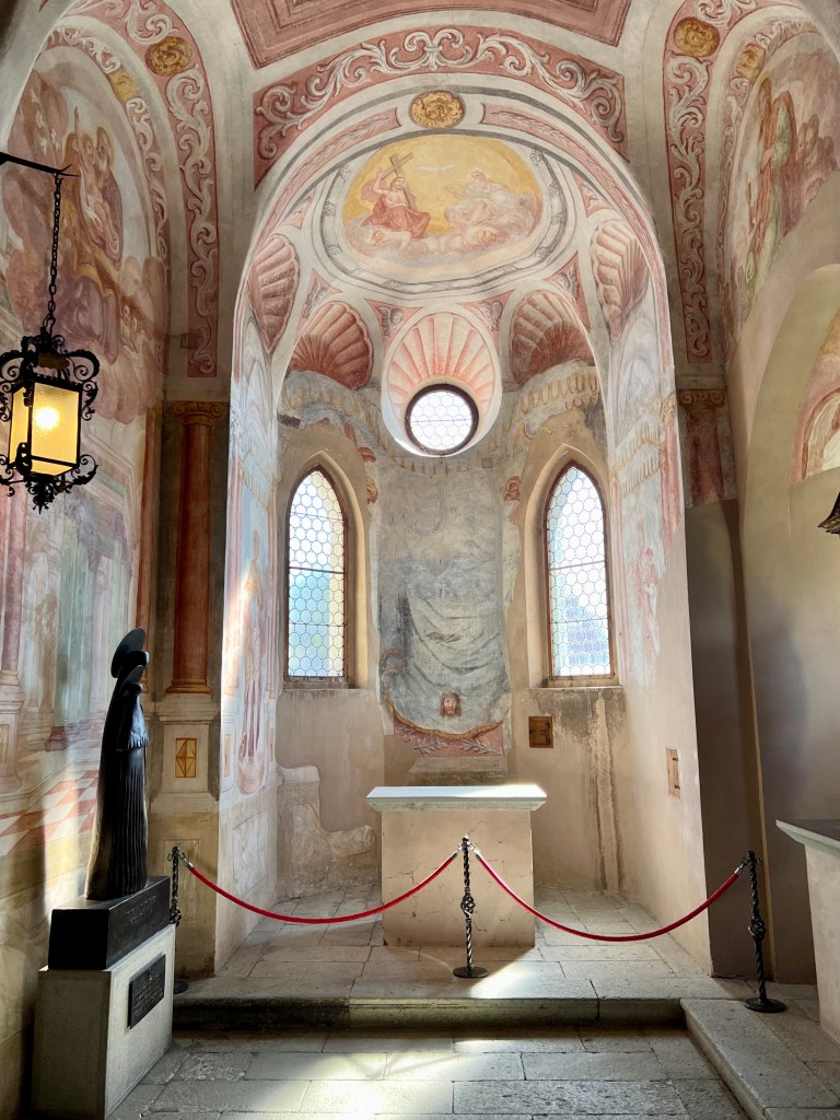 The inside of the Gothic chapel within the castle walls of Bled Castle is painted with the frescoes of its patrons.